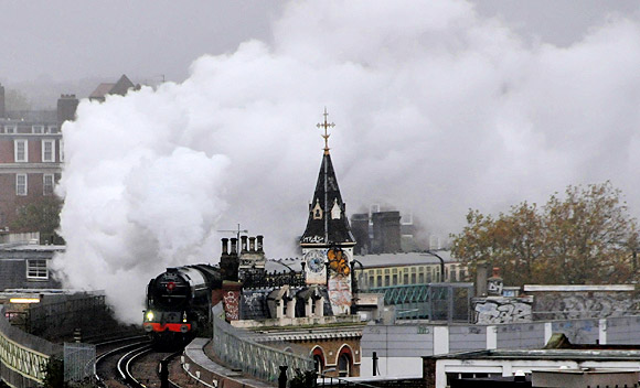 Tornado steam loco powers dramatically through Brixton