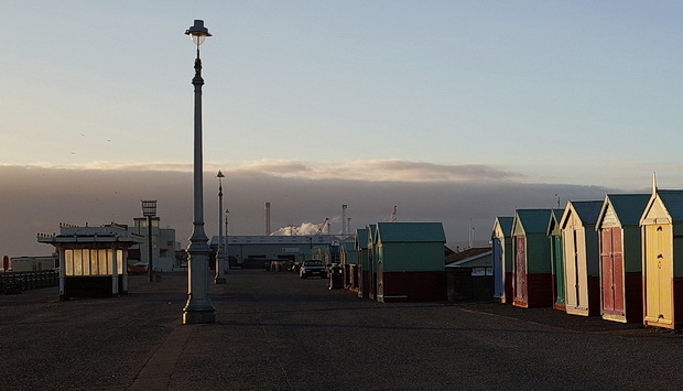 Brighton beach huts and shelters in the winter chill, Brighton and Hove, England, February 2015