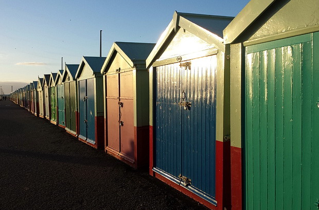 Brighton beach huts and shelters in the winter chill, Brighton and Hove, England, February 2015