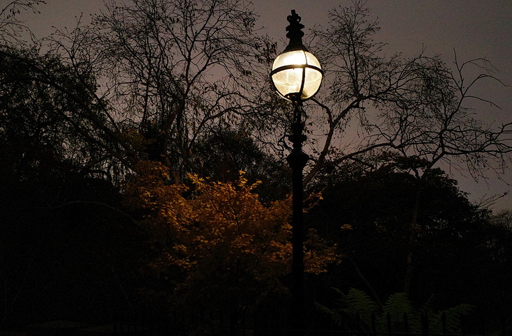 Gas lamps and late night views of Hyde Park, London