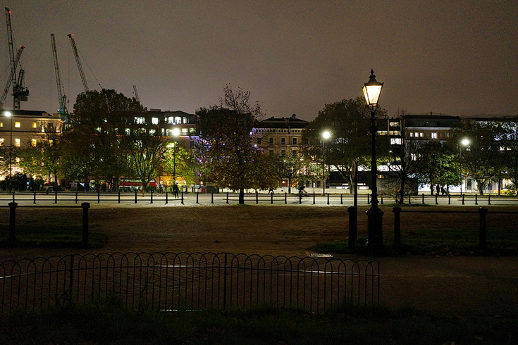 Gas lamps and late night views of Hyde Park, London