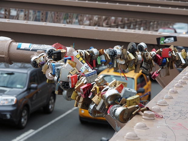 New York City is not pleased with the Love Padlock craze and orders them off Brooklyn Bridge, May 2014