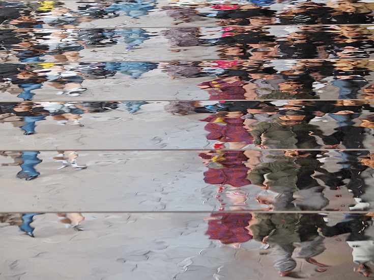 Oxford Street Reflections - abstract human shapes on a mirrored roof