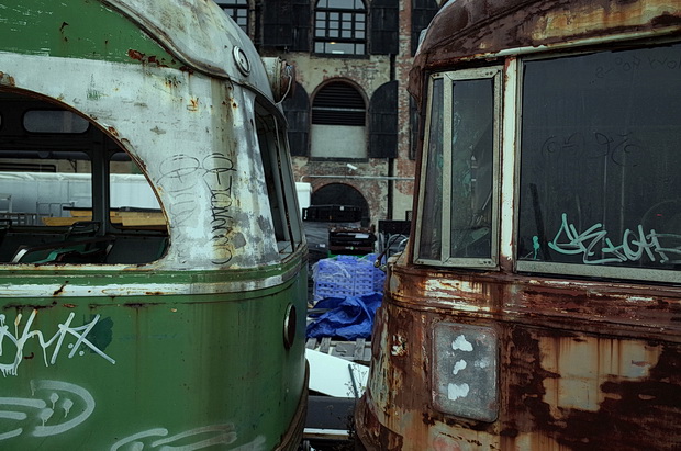 The abandoned trolley cars of Red Hook, New York are removed from the waterfront