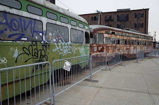 The abandoned trolley cars of Red Hook, New York are removed from the waterfront