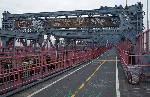 A walk across Williamsburg Bridge from Williamsburg, Brooklyn to Manhattan, new York
