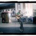 Brixton photos: a unicycling busker, street architecture and coffee You’ve got to give him points for effort here. A unicycling, guitar playing busker wearing rabbit ears sings it out loud outside KFC in central Brixton.