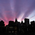Into Manhattan with a stunning Brooklyn Bridge sunset, NYC Walking across the Brooklyn Bridge into Manhattan one November evening, we were greeted by this absolutely stunning sunset.