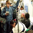 Busy scene on an early morning Manhattan subway. [More New York photos]