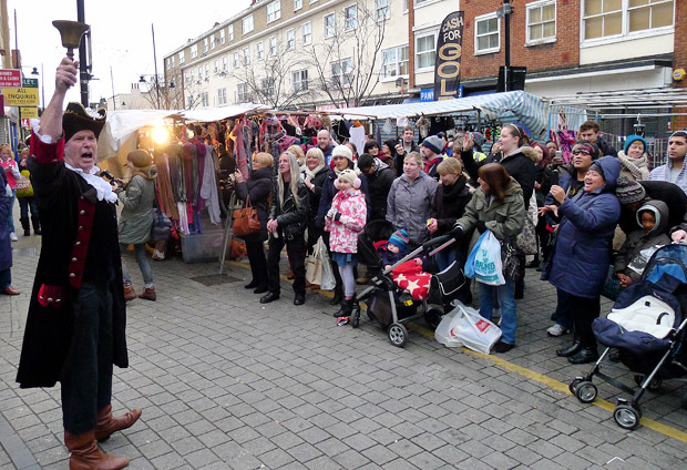 Christmas lights get turned on at Roman Road, east London, Mrs Mills Experience provide the music