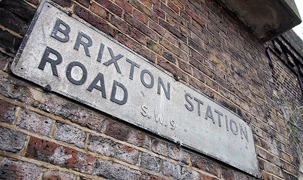 A photo walk down Brixton Station Road, Brixton – railway arches, doorways and a bridge mystery