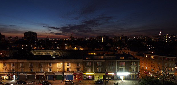 A view looking north over Coldharbour Lane towards central London, 10pm Sat 25th May 2013. The tall tower in the distance (central  left) is St George Wharf Tower, while the...