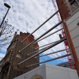 Houses held up by metal girders, 149 Oxford Street, London I came across this rather dramatic looking structure on 149-151 Oxford Street, central London, made up of a collection of long, angled metal girders holding up two adjacent buildings.