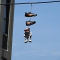 Sneakers dangling on the power lines of New York
