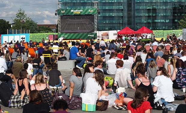 Big crowds soak up the sun and watch the tennis at Kings Cross
