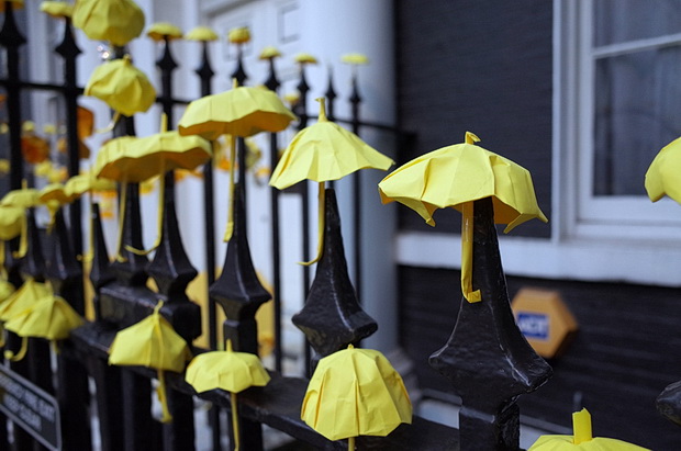 Support for the Umbrella Revolution in London as yellow umbrellas appear outside Hong Kong trade office