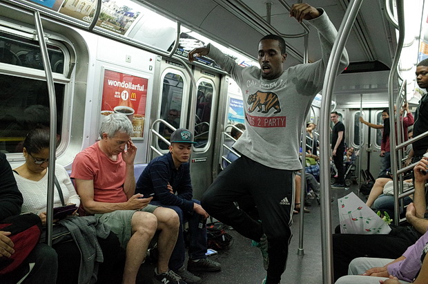 Don't look now, but there's dancers suspended from the subway roof: New York scenes