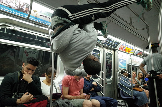 Don't look now, but there's dancers suspended from the subway roof: New York scenes