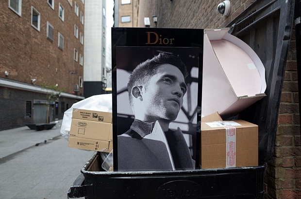 Photo of the day: Dior model in a dumpster, London