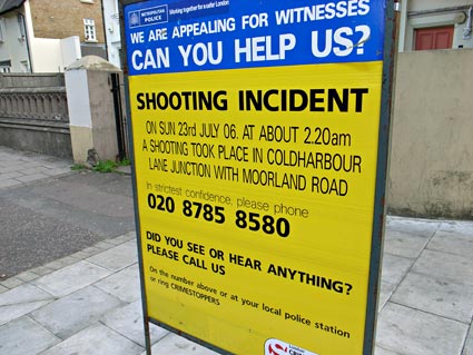 Yellow police incident board, Shooting Incident, corner of Coldharbour Lane and Moorland Road, SW9.