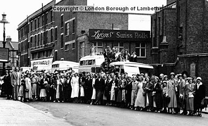 Morleys Staff set off for coach outing, Bernays Grove, Brixton Central, Lambeth London, 1937