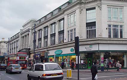 Quin and Axtens' corner stores at the junction of Brixton Road and Stockwell Road, Brixton, 2004