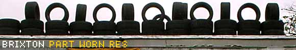 Part Worn Res, deconstructing tyre garage sign on Coldharbour Lane Brixton London SW9