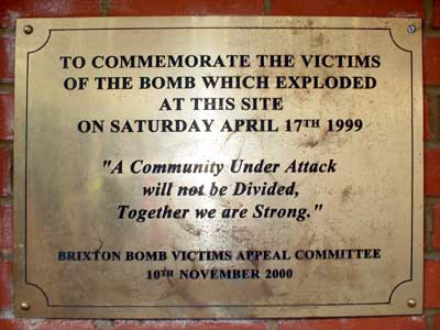 Brixton Bomber plaque, side of Iceland supermarket, Electric Avenue, Brixton, London SW9