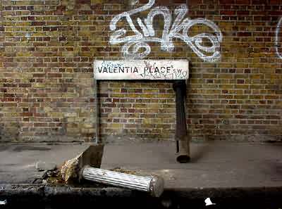 Valentia Place sign and broken bollard, Brixton