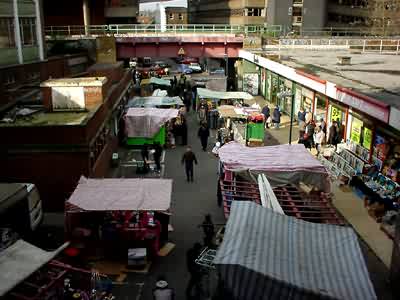 View of the street market from Brixton station, Brixton