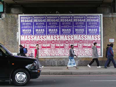 Street advertising, Brixton Road, Brixton, Lambeth, London, England SW9