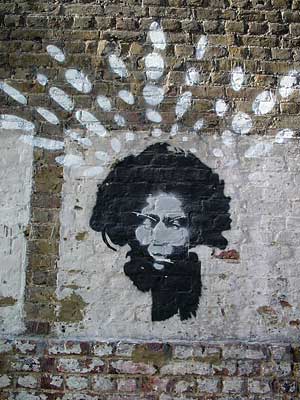 Stencil art graffiti, Electric Lane, Brixton, Lambeth, London, England SW9