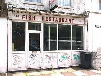 Closed fish and chip shop, Effra Parade, Brixton, Lambeth, London, England SW9