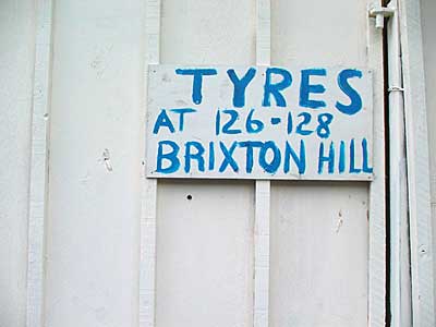 Tyre shop sign, Coldharbour Lane, Brixton, Lambeth, London, England SW9