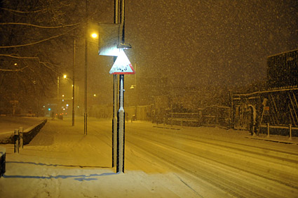 A snowy night in Brixton, Lambeth, London SW9 - scenes on Electric Avenue, Coldharbour Lane, Brixton Road, 2nd February 2009
