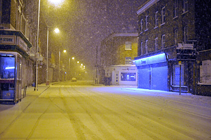 A snowy night in Brixton, Lambeth, London SW9 - scenes on Electric Avenue, Coldharbour Lane, Brixton Road, 2nd February 2009