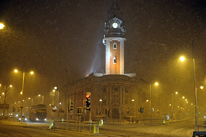 A snowy night in Brixton, Lambeth, London SW9 - scenes on Electric Avenue, Coldharbour Lane, Brixton Road, 2nd February 2009