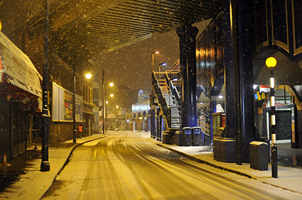 A snowy night in Brixton, Lambeth, London SW9 - scenes on Electric Avenue, Coldharbour Lane, Brixton Road, 2nd February 2009