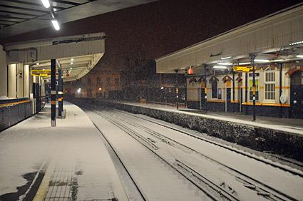 A snowy night in Brixton, Lambeth, London SW9 - scenes on Electric Avenue, Coldharbour Lane, Brixton Road, 2nd February 2009
