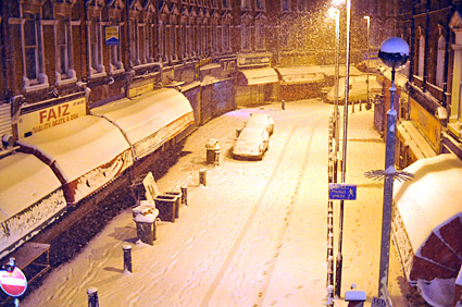 A snowy night in Brixton, Lambeth, London SW9 - scenes on Electric Avenue, Coldharbour Lane, Brixton Road, 2nd February 2009