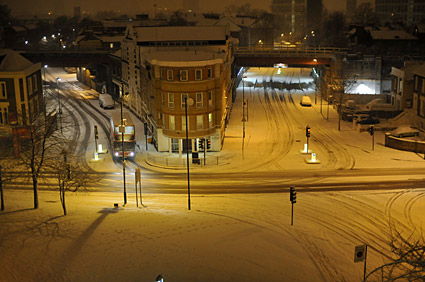 A snowy night in Brixton, Lambeth, London SW9 - scenes on Electric Avenue, Coldharbour Lane, Brixton Road, 2nd February 2009