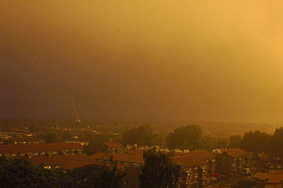 Strange colours as the sun sets on Brixton, August 24th 2005