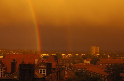 Strange colours as the sun sets on Brixton, August 24th 2005
