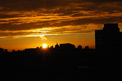 Strange colours as the sun sets on Brixton, August 24th 2005