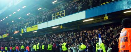 City fans celebrate at the final whistle as Cardiff beat QPR 4-0
