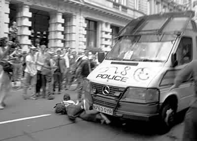 police van runs down bystander