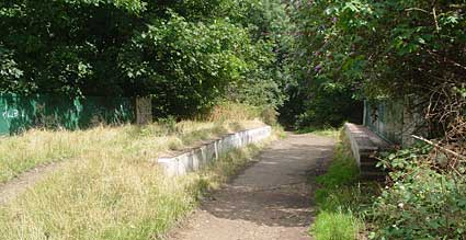 Crossing the Mount Pleasant Villas bridge, Finsbury Park to Highgate abandoned railway line, Haringey, London