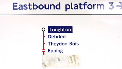 Station sign with covered up Ongar branch, Theydon Bois tube station, Essex