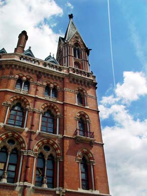 Jet trails and the central tower, Midland Grand, St Pancras railway station, June 2003 London UK