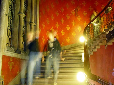Ghostly walkers down the Grand Stair, Midland Grand, St Pancras, Euston Road, London UK
